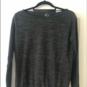 Nike Long-sleeved grey women’s workout shirt.